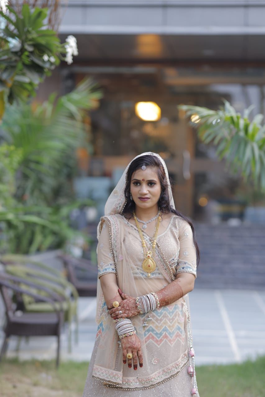 Bridal hairstyle and makeup side profile